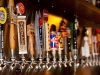 Find 32 Colorado Craft Beers on Tap at the Glass Half Full Bar inside the Alamo Drafthouse Littleton