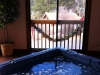 Make a reservation for the private hot tub at the McGregor Mountain Lodge in Estes Park. 