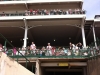 Crowds watching at Churchill Downs before Oaks