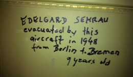 The walls are etched with memories and signatures of Vietnam War Vets who have flown in the aircraft