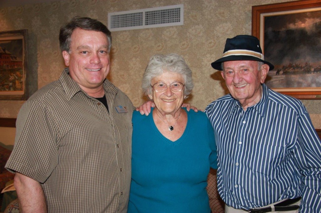 Dory Zelenka pictured with owners of Glenwood Hot Springs Pool John & Hank Bosco.